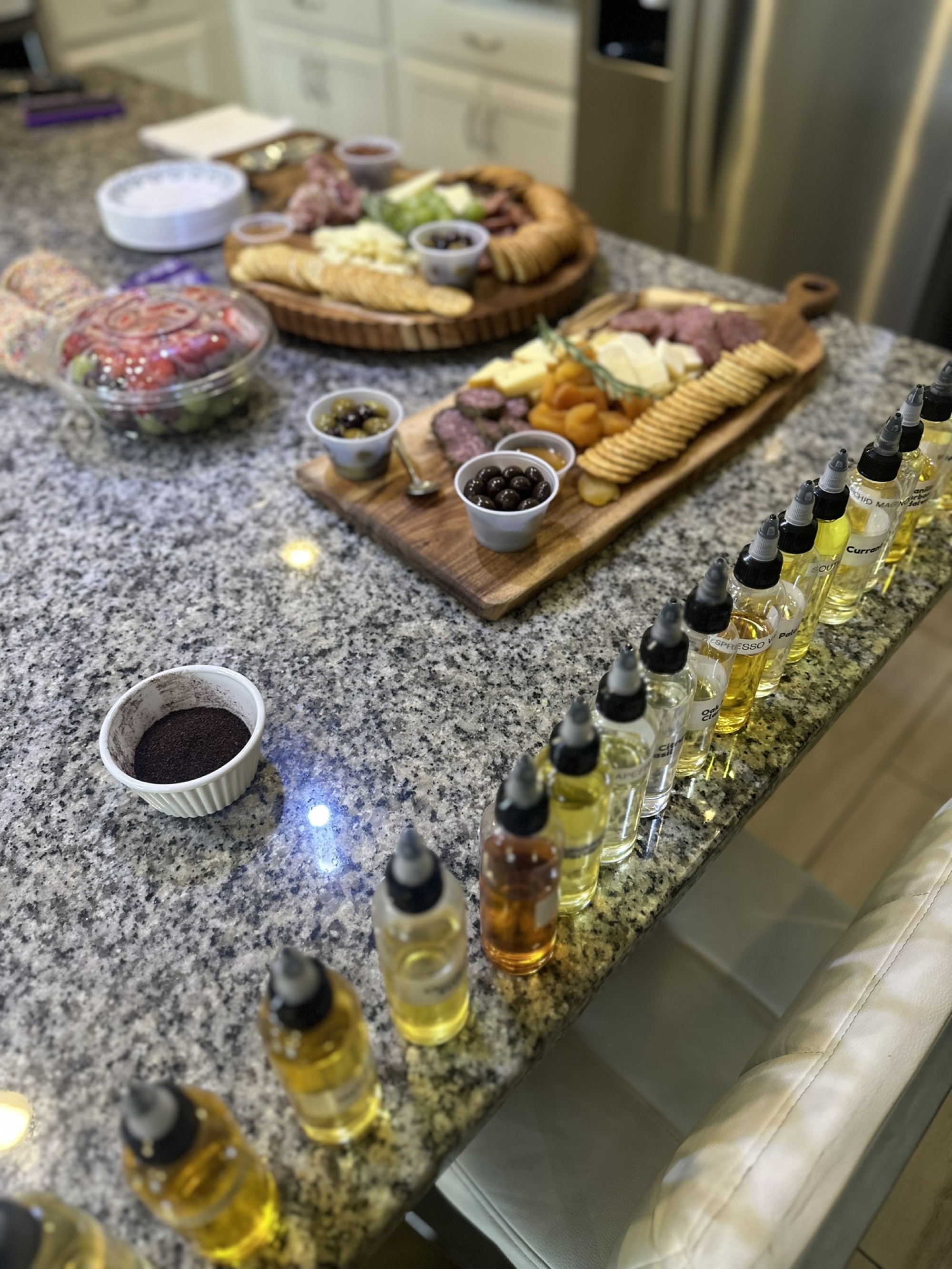 Guests blending fragrance during a candle-making event