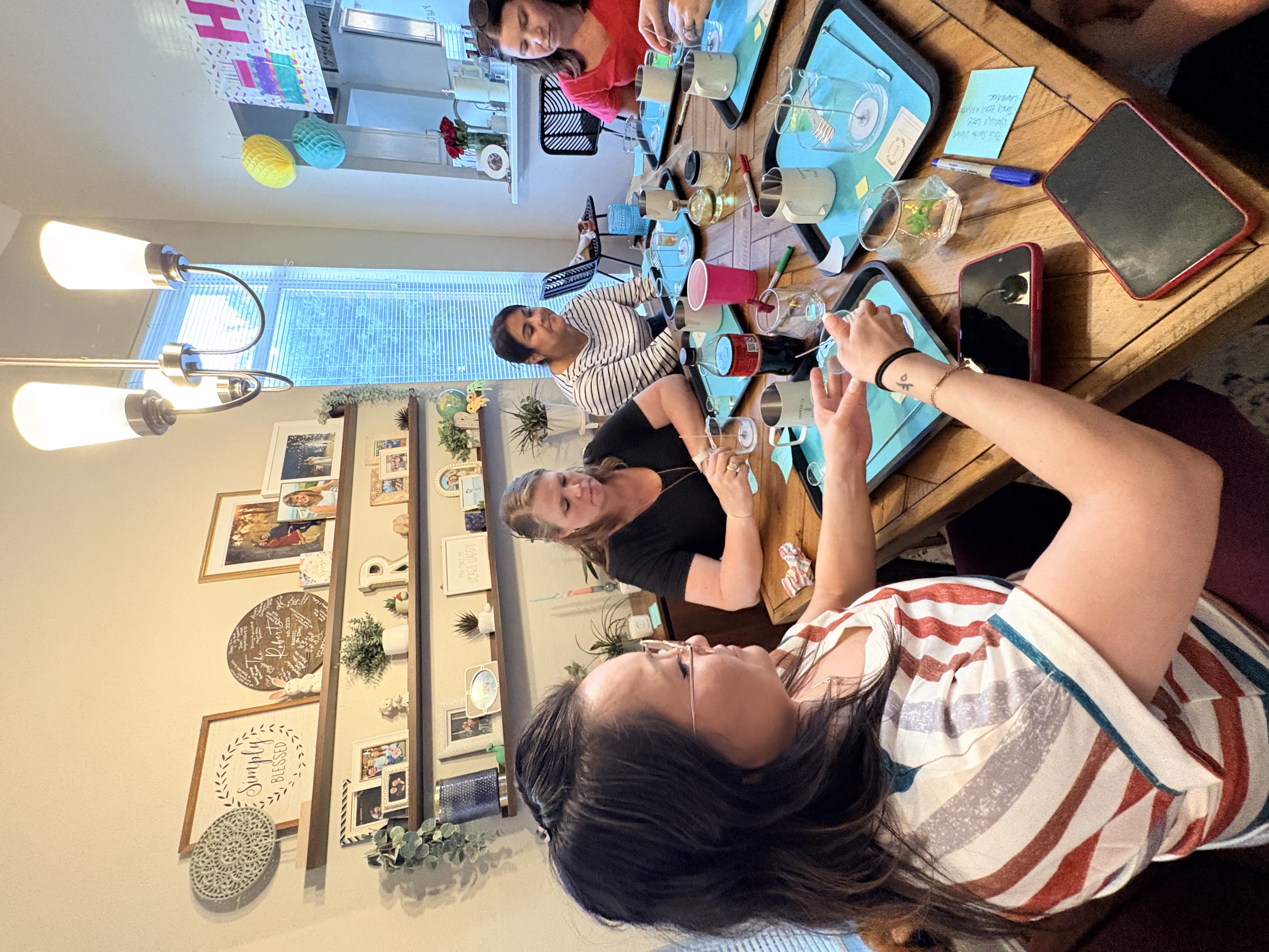 Families and guests making candles at a local pop-up
