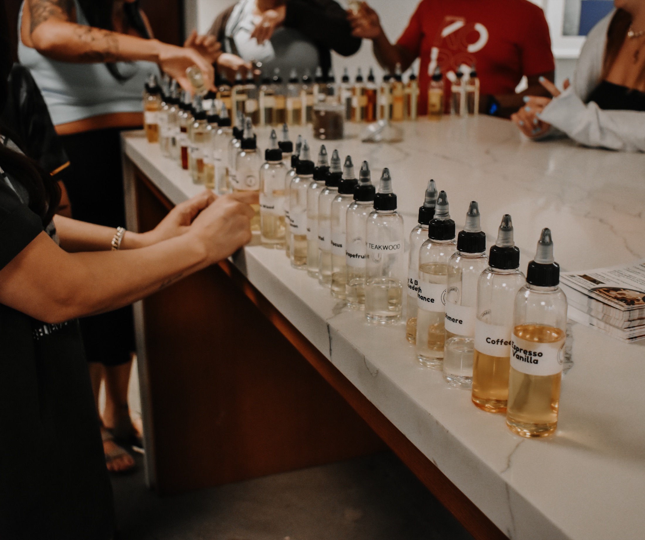 Fragrance oils arranged for guests to blend custom scents